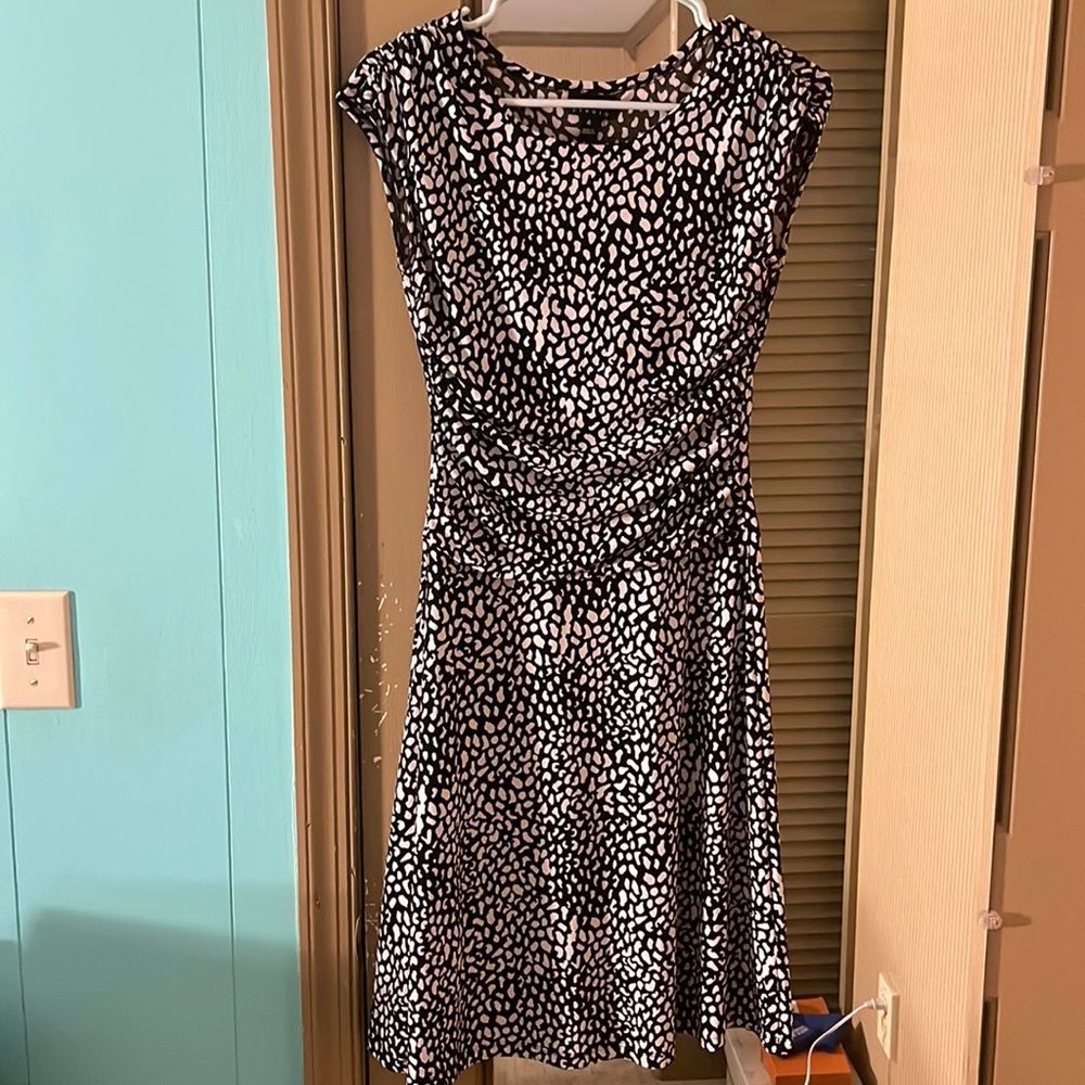 Black dress with white print. Size 4.